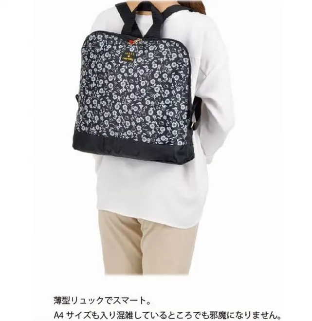 SWANY  Hello Kitty Collaboration Bag monochrome Print Backpack Black 7L  A-337